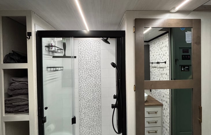Washer dryer behind mirror