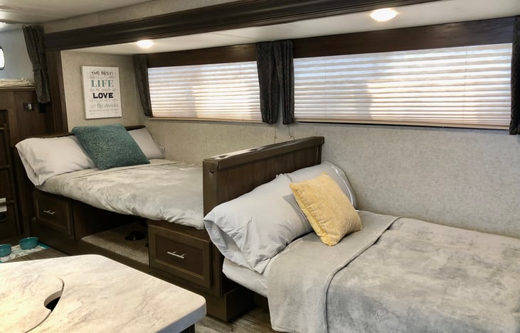 Table and sofa fold out into beds