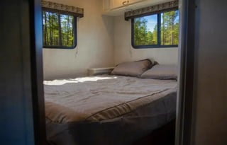 C06 - 10 Person w/ Bunk- The RV Rental Factory