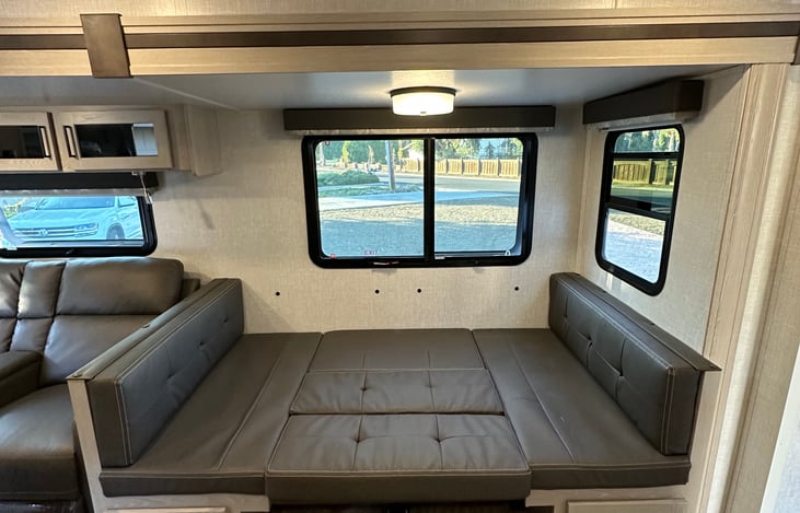 Turns in to a full size bed or a lounge area for a family movie night in the trailer!