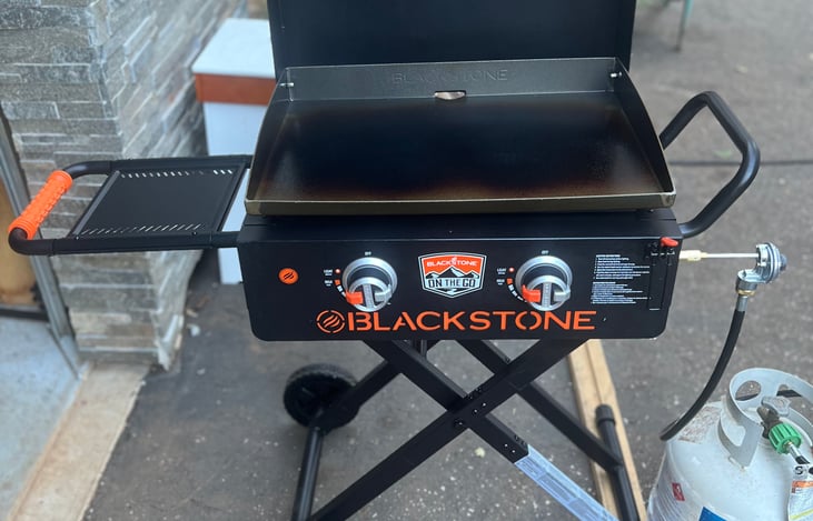 Delivery Only Add on; Easy to maneuver and wheel anywhere on your campsite. Add on- Large 22" 'On the Go' Blackstone with 5 gallons propane tank, utensils.