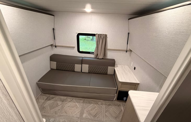 Private bunkhouse room with bunks folded up