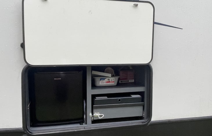 Outdoor Propane Kitchen with burners and mini fridge.