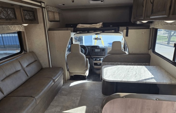Interior - Bed above cab, Sofa and Dinette convert into beds