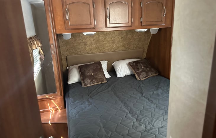 Residential queen bed in front room