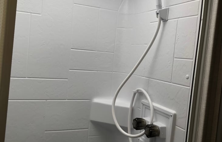 Nice size shower with dry camping feature.