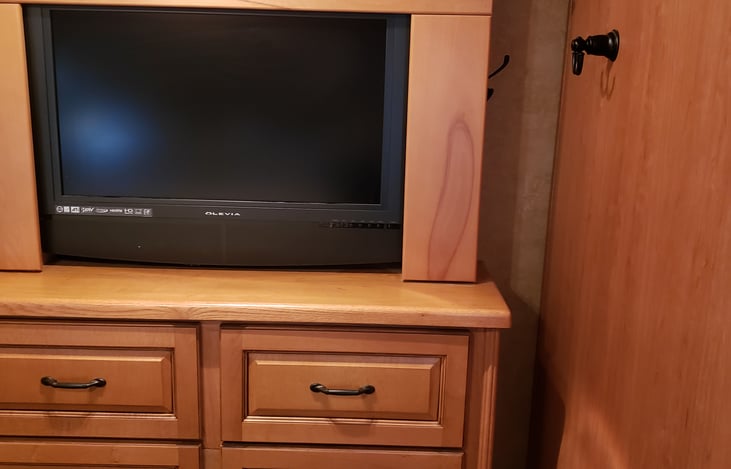 Master bedroom dresser and flat screen tv