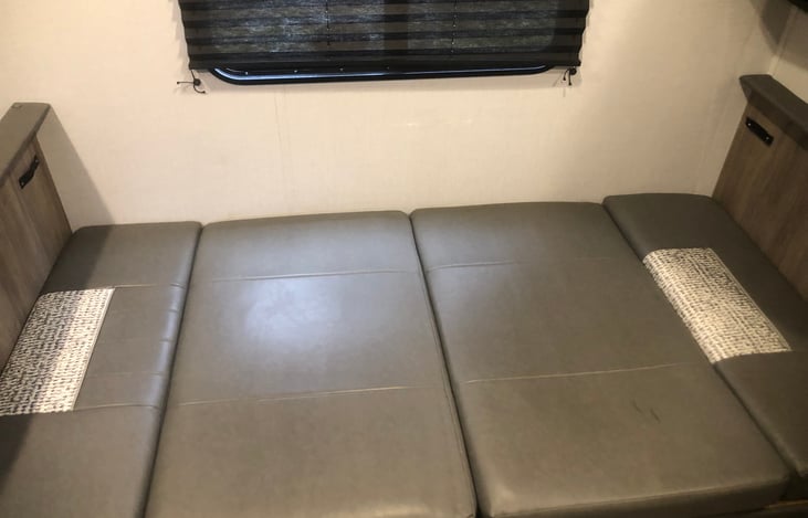 Dinette table converted into a bed