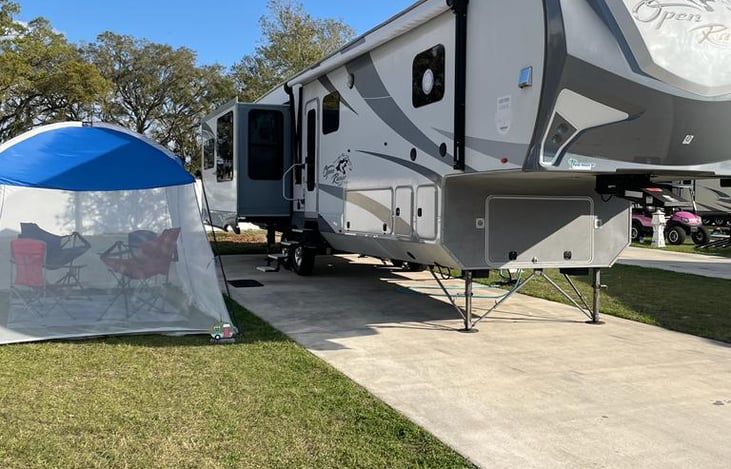 Front exterior with canopy add on set up.