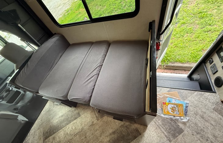 This is the kitchen table made into a bed for the littles. This is a great area for a pack and play at night.