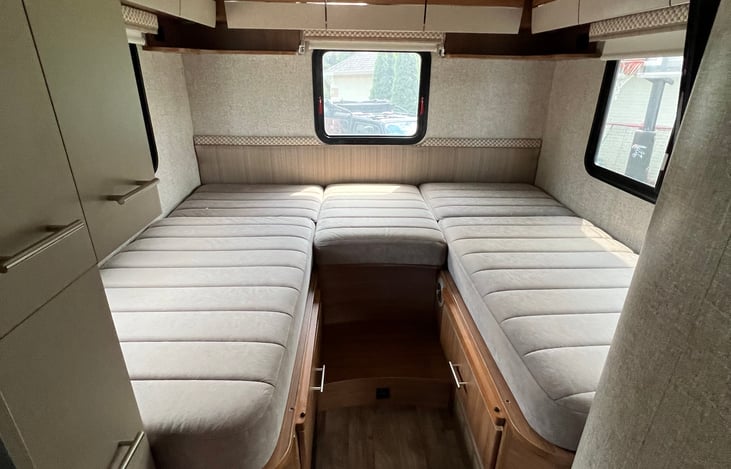 This is the rear bed divided to make two twins upon request beds (we provide bedding)