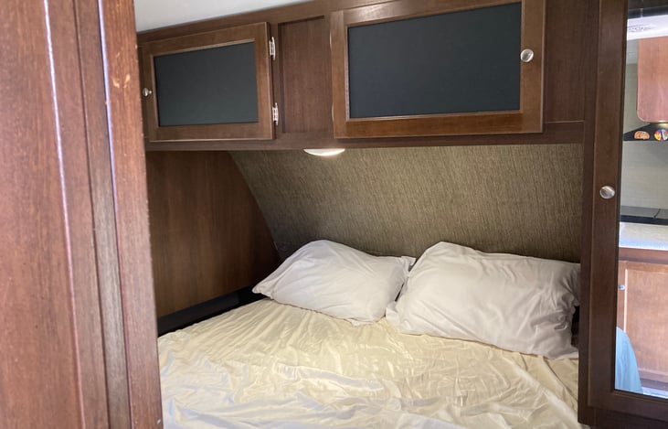 Master Bed, has own TV on the wall, and sliding doors for privacy.