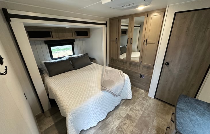 Bedroom one with queen size bed.