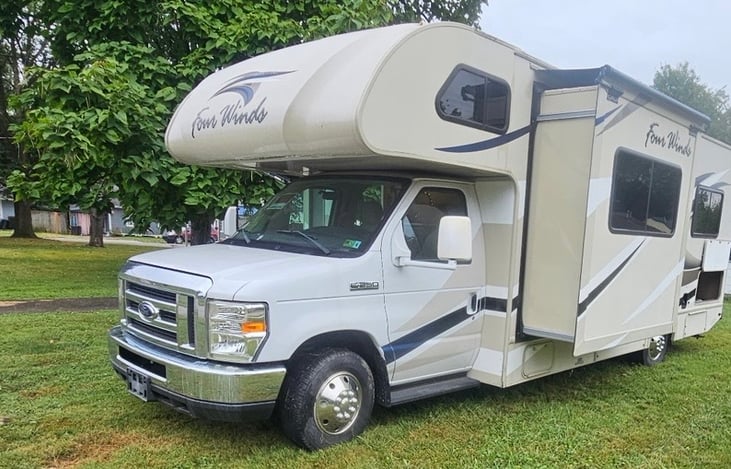 Front view of Titan with slide out and storage compartment open.