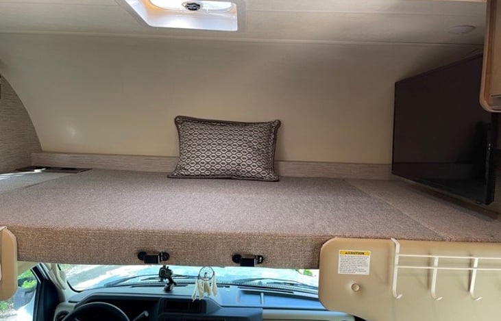 Second twin size bed over cab