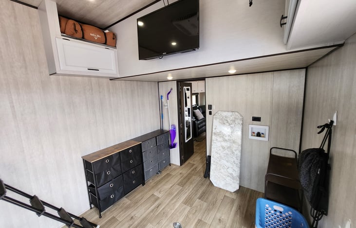 Facing from the rear of the garage to the front you can find plenty of storage, Drawers for the kids, and additional sleeping pads/mats.