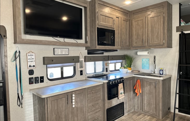 Fully stocked kitchen with oven/stove, microwave, coffee pot, dishes, crock pot, pots and pans 

Smart TV