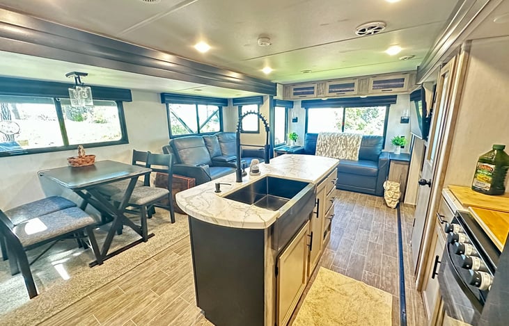 Two slides outs create a very large living space.  The recliners have heaters and massagers!  The couch can pull out if you host 3 or 4 guests for an extra fee.