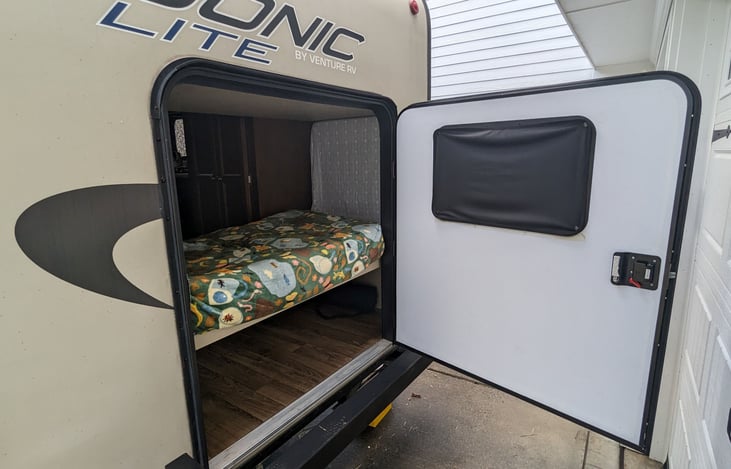 Back door is super convenient for storing bikes and other large gear en route to the campground!