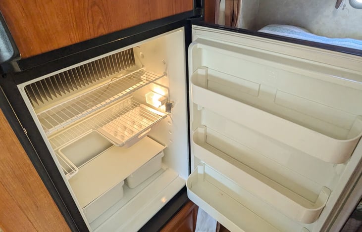 Nice large fridge with a great freezer. Comes with glass storage containers for leftovers. Stock up for your whole trip.