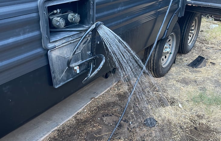 Outdoor shower/brand new tires