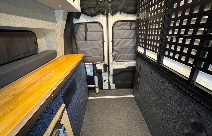 The van features blackout insulated magnetic window covers that ensure privacy, block light, and improve insulation to keep you comfy. They're easy to attach and remove—perfect for any adventure.