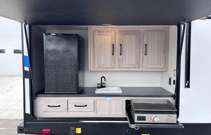 Outside Kitchen with Blackstone grill.  Cooking utensils provided