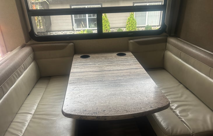 The dinette folds down and makes a small bed.