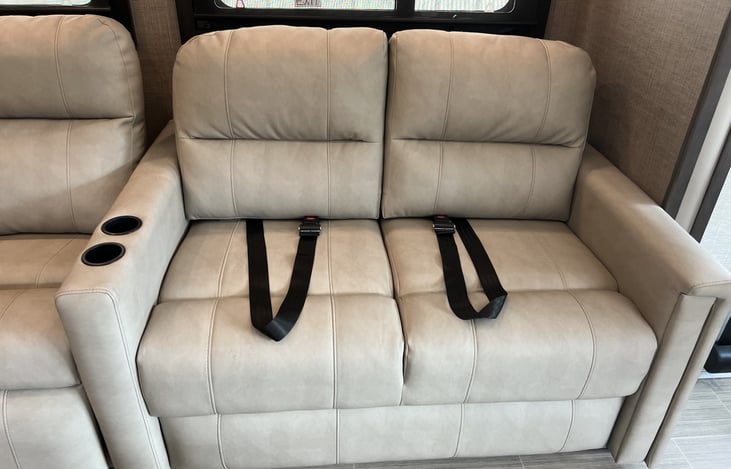 Sofa with seat belts