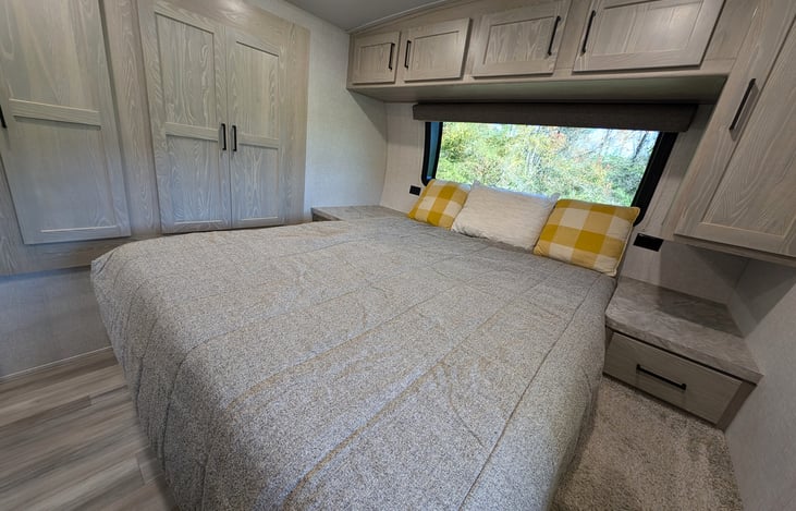 Spacious master bedroom with queen bed and tons of storage space