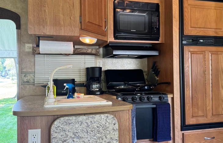 Kitchen comes fully stocked including a coffee maker, toaster and blender