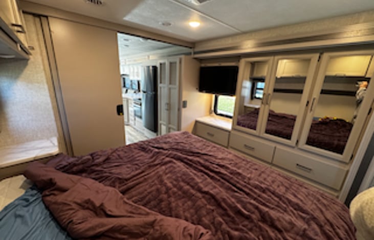 Master bedroom with plenty of storage and TV!