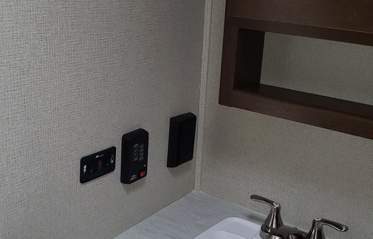 System monitors for water and waste.