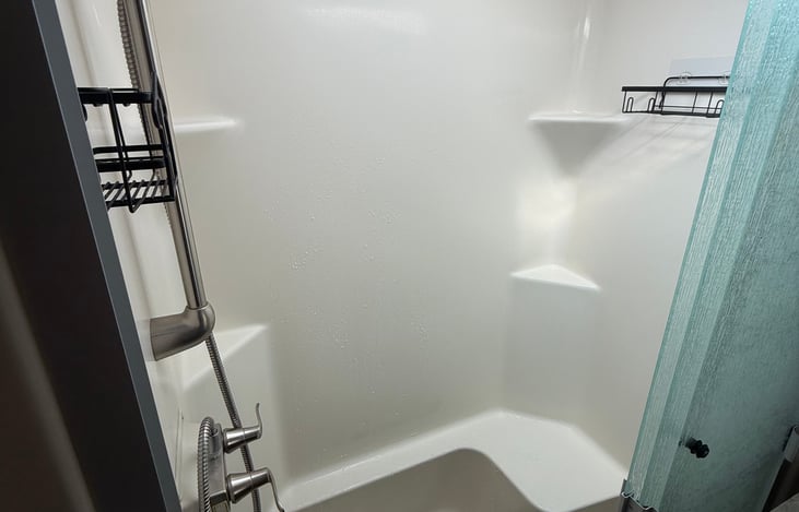 Shower with upgraded shower head