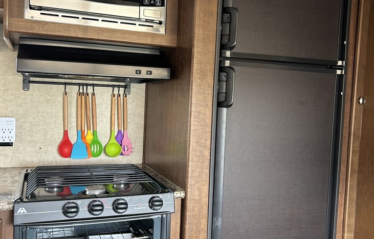 Three burner stove with oven.