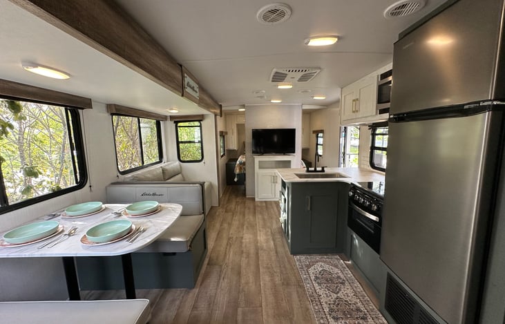 Spacious living area. Dinette converts into Twin XL bed, and futon converts into twin size bed