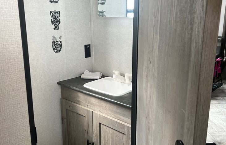 Bunkhouse half bathroom.