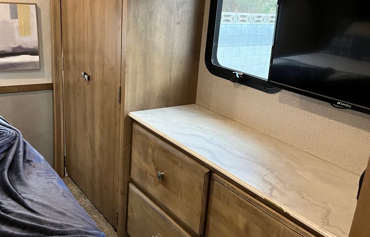 Master Bedroom Closet and Dresser with TV