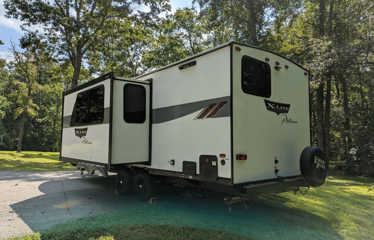 Step into comfort with this 2024 Wildwood X-Lite 240BHXL. This family-friendly bunkhouse camper comfortably sleeps up to 8 with a King-size Versa-Tilt bed, large bunks, modern interior, and more.
