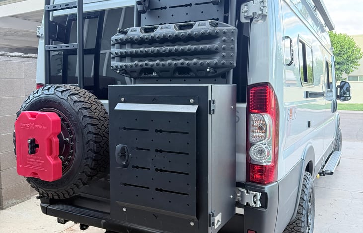 Exterior Cargo and Mechanical Awning above Sliding Door