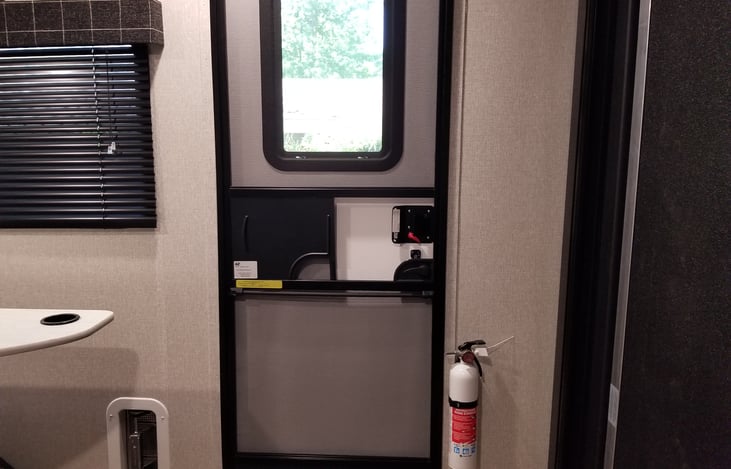 Entrance Door / Fire Extinguisher