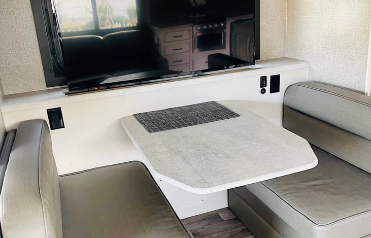 RV - dinette booth with TV
