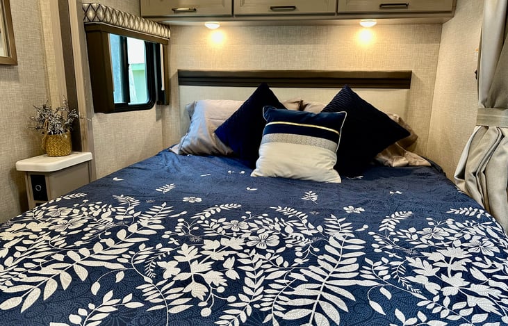 This is the queen Murphy style bed that tucks up nicely to a comfy couch when not in use!