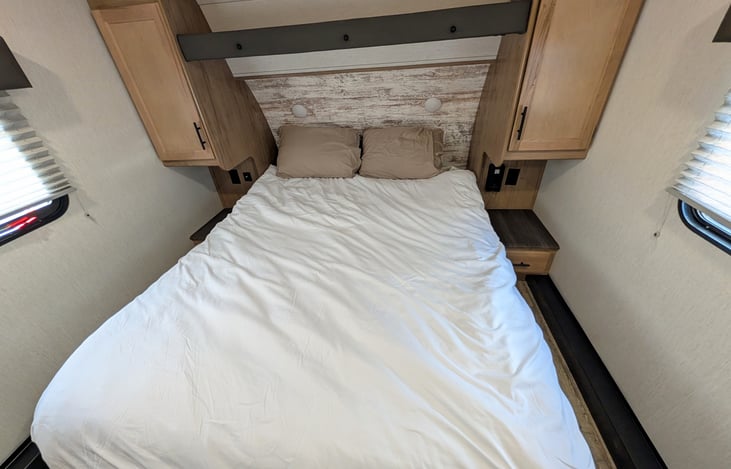 Cozy front bedroom with ample storage.