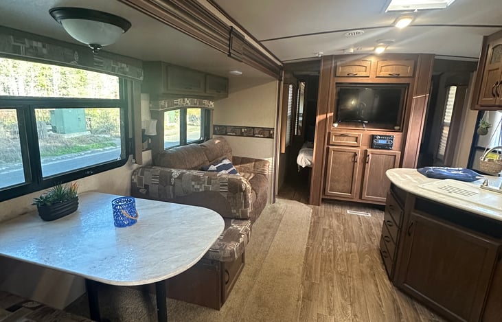 Entertainment center, TV, DVD plater,  Bluetooth.  Dinette (converts to bed), love seat (converts to bed)