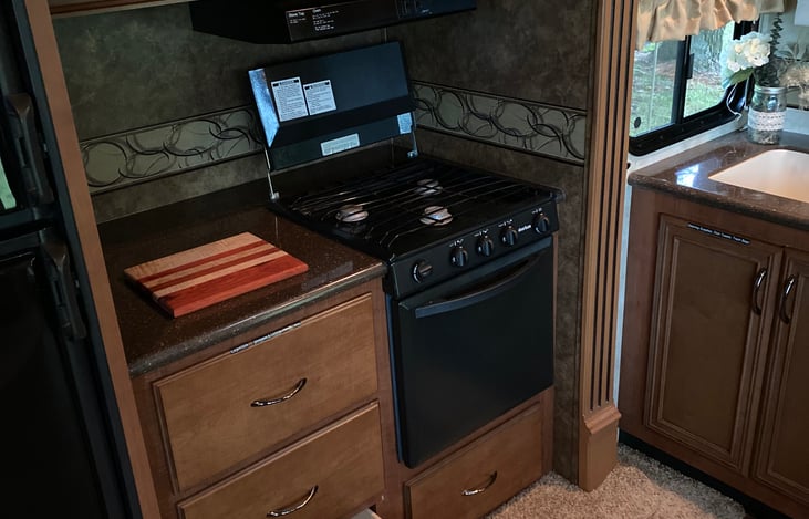3 Burner Propane Stove and Microwave.