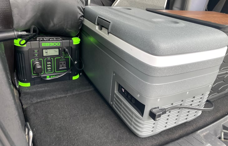 Electric cooler and 300w power station to keep your food cool between trips and charge your devices