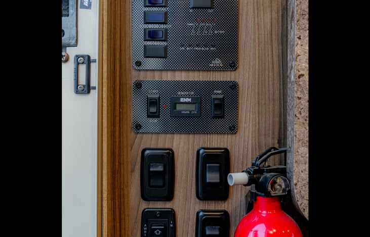 Control panel located by the entry. Manage the lights, awning, slide-out, generator, etc all in one place