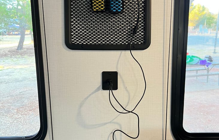 Walkie Talkie Radios. 
Bright tactical flashlight.