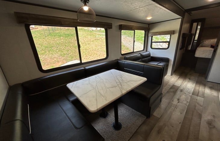 U-shaped Dinette and Reclining Sofa in the slide